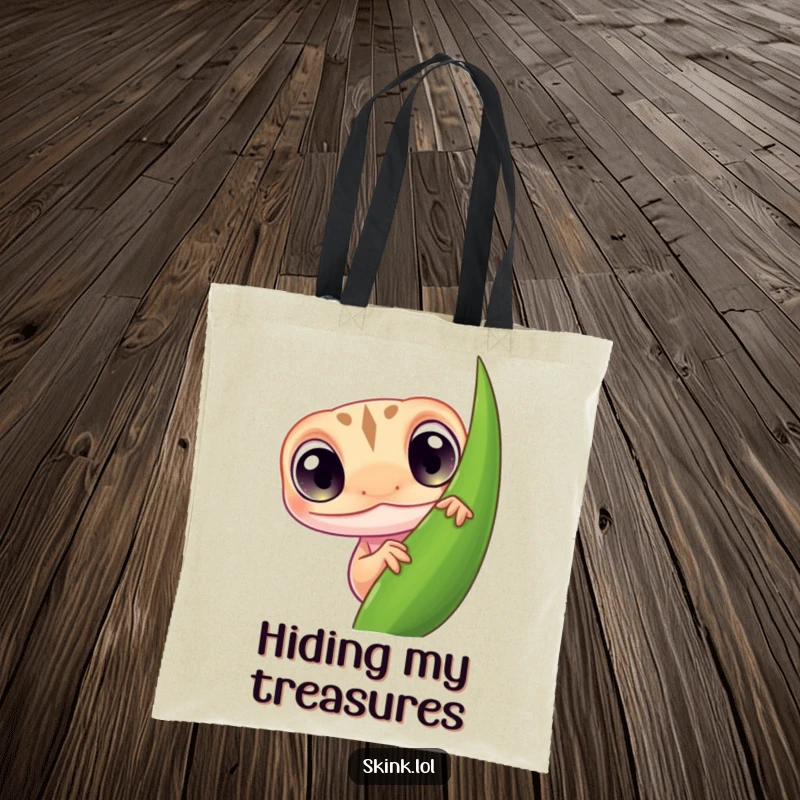 Funny skink tote bag, tiny with large curious eyes, peeking from behind a leaf, a humorous accessory.